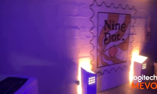 Nine Dot event sign and DJ setup