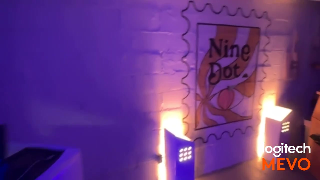 Nine Dot event sign and DJ setup